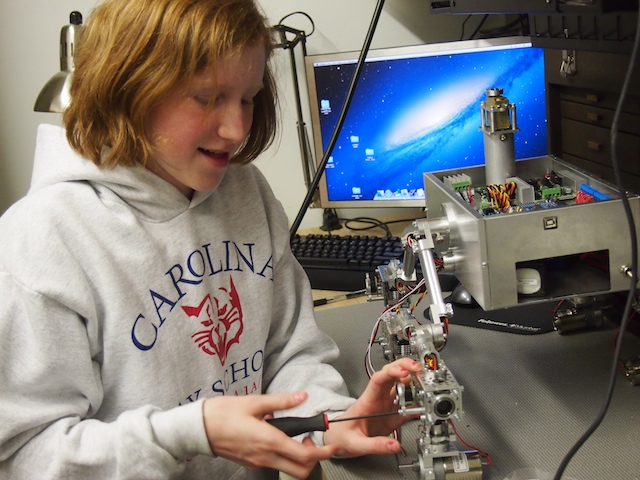 Camille works on the rocker-bogie suspension system. She's done most of the mechanical construction on the robot.