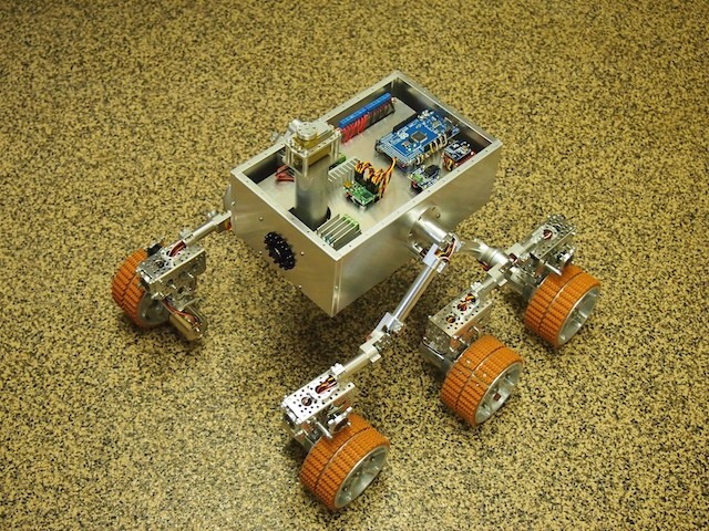 Slowly but surely, we're making progress. We've assembled and installed the wheels. We sill need to complete the rover's top, solar panels, mast head, and many other elements. Stay tuned.